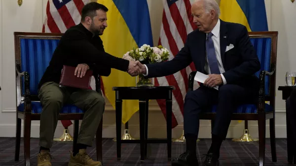 U.S. President Joe Biden shakes hands with Ukrainian President Volodymyr Zelenskiy in Paris, France, June 7, 2024. REUTERS/Elizabeth Frantz