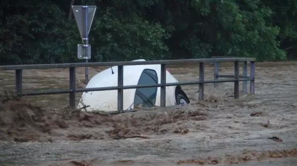 09 June 2024, Austria, Schäffern: A car submerged in water as torrential rainfall once again caused numerous floods early 09 June in Austria. Photo: Einsatzdoku.At Patrik Lechner/APA/dpa