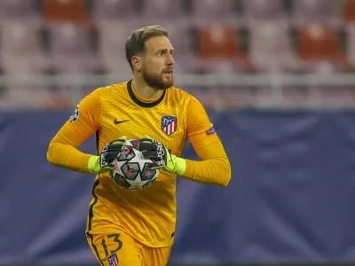 Atletico Madrid's goalkeeper Jan Oblak holds the ball during the Champions League, round of 16, first leg soccer match between Atletico Madrid and Chelsea at the National Arena stadium in Bucharest, Romania, Tuesday, Feb. 23, 2021. (AP Photo/Vadim Ghirda)