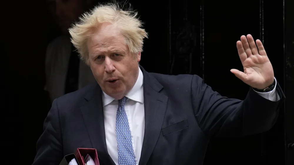 FILE - British Prime Minister Boris Johnson leaves 10 Downing Street to attend the weekly Prime Minister's Questions at the Houses of Parliament, in London, Wednesday, May 25, 2022. Britain's governing Conservatives will hold a no-confidence vote in Prime Minister Boris Johnson on Monday, June 6, 2022 that could oust him as Britain's leader. (AP Photo/Matt Dunham, File)