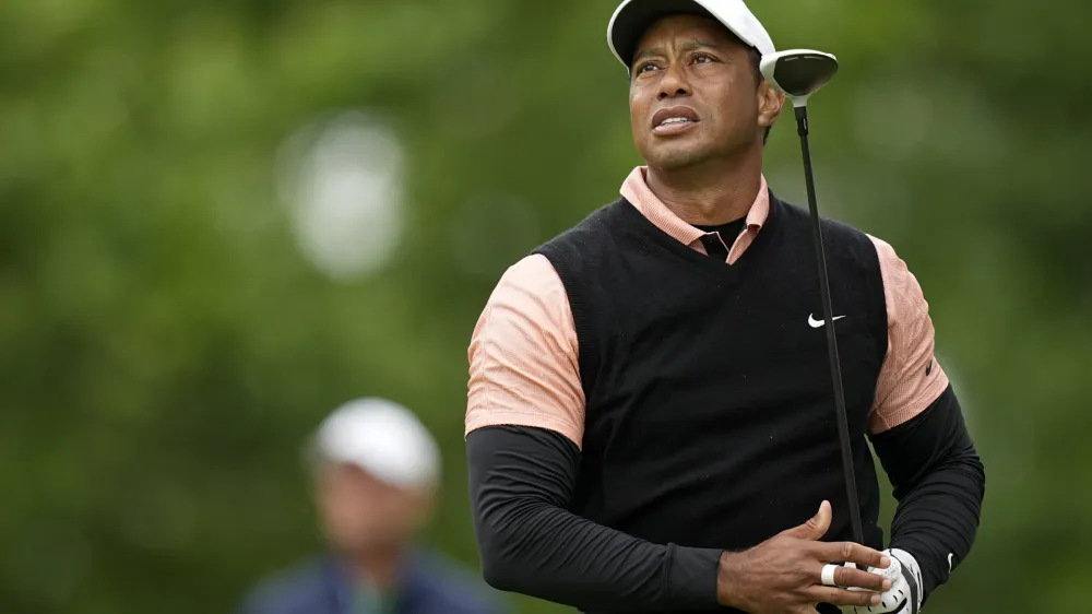 Tiger Woods watches his tee shot on the 17th hole during the third round of the PGA Championship golf tournament at Southern Hills Country Club, Saturday, May 21, 2022, in Tulsa, Okla. (AP Photo/Eric Gay)