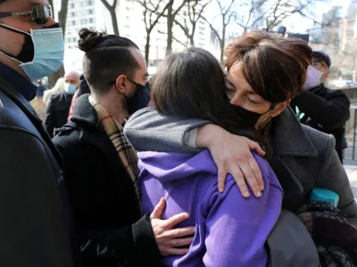 FILE PHOTO: Families of the victims of a deadly 2018 van attack react after the verdict in the trial of Alek Minassian was delivered, outside the provincial Superior Court of Justice in Toronto, Ontario, Canada March 3, 2021. REUTERS/Chris Helgren/File Photo