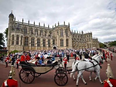 Britain's Prince Charles, Camilla, Duchess of Cornwall, Prince William and Kate, Duchess of Cambridge, leave after the Order of the Garter service at Windsor Castle, in Windsor, England, Monday, June 13, 2022. The Order of the Garter is the oldest and most senior Order of Chivalry in Britain, established by King Edward III nearly 700 years ago. This year Prince Charles' wife Camilla, the Duchess of Cornwall, former British Prime Minister Tony Blair and former leader of the British House of Lords Baroness Amos were all installed in the Order. (Ben Stansall/Pool via AP)