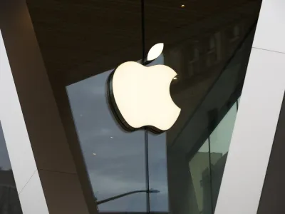 FILE - The Apple logo adorns the facade of a retail store. More than 100 employees of an Apple store in a suburb of Baltimore voted to unionize by a nearly 2-to-1 margin Saturday, June 18, 2022, joining a growing U.S. push across tech, retail and service industries to organize for greater workplace protections, a union said. (AP Photo/Kathy Willens, File)