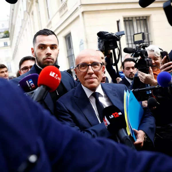 Eric Ciotti, head of the French conservative party Les Republicains (The Republicans - LR), is surrounded by journalists as he leaves the LR party headquarters in Paris, as French political parties try to build alliances ahead of early legislative elections in France, June 11, 2024. REUTERS/Sarah Meyssonnier