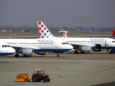 Croatia Airlines aircraft are seen on the tarmac during a strike by employees at Pleso international airport in Zagreb March 8, 2012. The 24-hour strike, in protest over financial losses and the possible loss of rights and entitlements, forced the cancellation of half of all the carrier's scheduled flights. REUTERS/Antonio Bronic (CROATIA - Tags: TRANSPORT BUSINESS EMPLOYMENT)