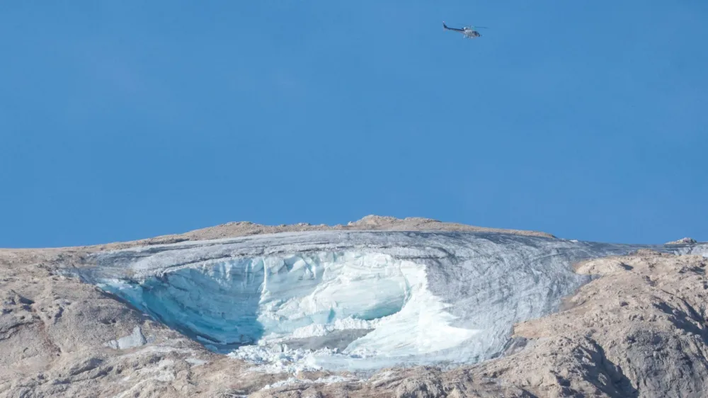 Punta Rocca summit is seen after parts of the Marmolada glacier collapsed in the Italian Alps amid record temperatures, killing at least six people and injuring several, at Marmolada ridge, Italy, July 4, 2022. REUTERS/Borut Zivulovic