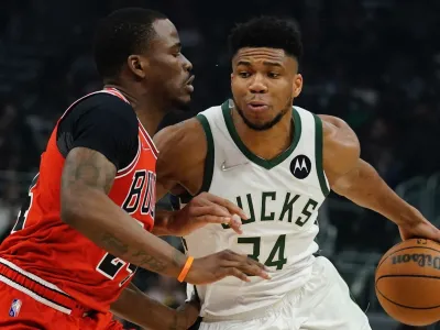 Milwaukee Bucks' Giannis Antetokounmpo drives past Chicago Bulls' Javonte Green during the first half of an NBA basketball game Tuesday, March 22, 2022, in Milwaukee. (AP Photo/Morry Gash)