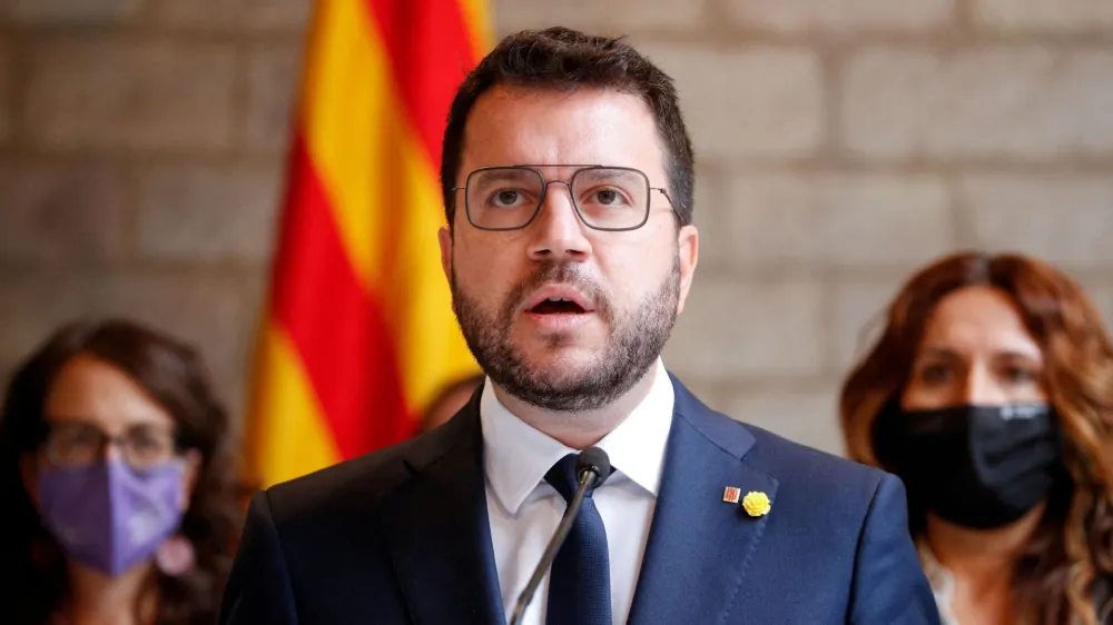 FILE PHOTO: Catalonia's regional President Pere Aragones gives a news conference at Palau de la Generalitat, following the arrest of former Catalan government head Carles Puigdemont in Sardinia on Thursday, in Barcelona, Spain, September 24, 2021. REUTERS/Albert Gea/File Photo