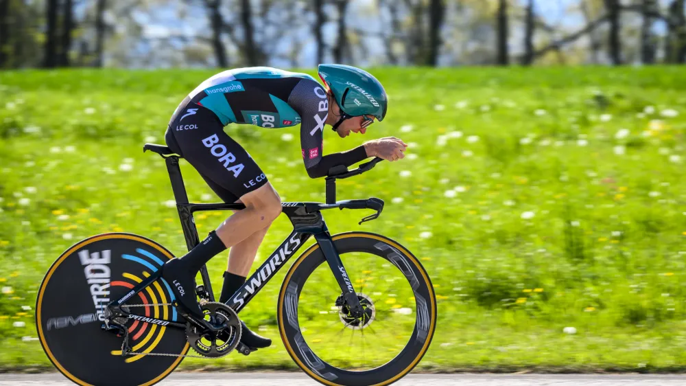 Aleksandr Vlasov from Russia competes in the prologue, a 5,12 km race against the clock at the 75th Tour de Romandie UCI ProTour cycling race in Lausanne, Switzerland, Tuesday, April 26, 2022. (Jean-Christophe Bott/Keystone via AP)