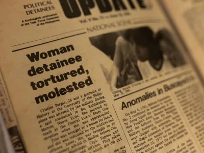 A newspaper with an article about Cristina Bawagan's arrest, torture and sexual abuse during the late Philippines' dictator Ferdinand Marcos's brutal era of martial law, is photographed in her home in Quezon City, Metro Manila, Philippines, April 22, 2022. Picture taken April 22, 2022. REUTERS/Eloisa Lopez