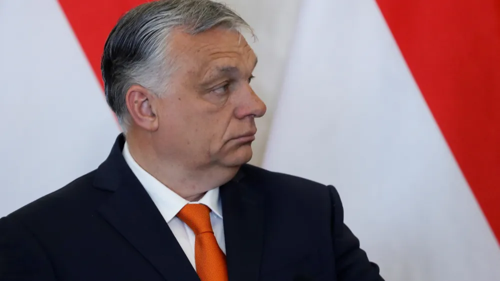 Hungarian Prime Minister Viktor Orban looks on as he and Hungarian President Janos Ader give a statement to the media after their talks at the Presidential Palace in Budapest, Hungary, April 29, 2022. REUTERS/Bernadett Szabo
