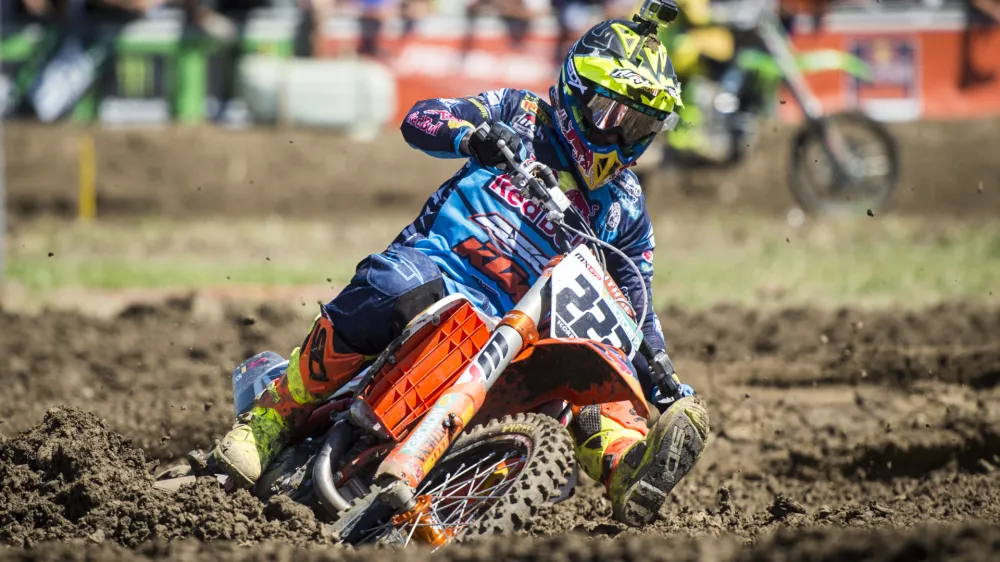 Rider Antonio "Tony" Cairoli of Italy competes during the first race in the MXGP class of the Motocross MXGP Grand Prix on Sunday, Aug. 7, 2016, in Frauenfeld, Switzerland.  (Benjamin Manser/Keystone via AP)