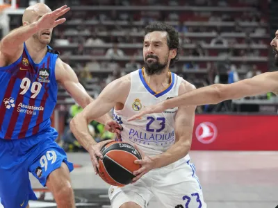 Real Madrid's Sergio Llull drives to the basket during a Final Four Euroleague semifinal basketball match between Barcelona and Real Madrid, in Belgrade, Serbia, Thursday, May 19, 2022. (AP Photo/Darko Vojinovic)