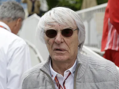 FILE - Former Formula One boss Bernie Ecclestone stands at the starting grid prior to the start of the Azerbaijan Formula One Grand Prix at the city circuit in Baku, Azerbaijan, April 29, 2018. Ecclestone, who has family in Brazil, was arrested in the South American nation on May 25, 2022 for having a gun while boarding a plane, police said Thursday, May 26, 2022, and released on bail. (AP Photo/Luca Bruno, File)