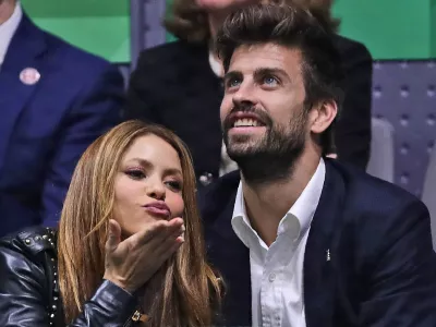 FILE - Colombian singer Shakira blows a kiss next to her husband Barcelona soccer player Gerard Pique while watching the Davis Cup final in Madrid, Spain, on Nov. 24, 2019. Colombian pop star Shakira and her partner, Spanish soccer star Gerard Piqu&eacute;, are separating. In a statement released on Saturday by Shakira's PR firm, the pair said: "We regret to confirm that we are separating. For the well-being of our children, who are our highest priority, we ask that you respect our privacy. (AP Photo/Manu Fernandez, File)
