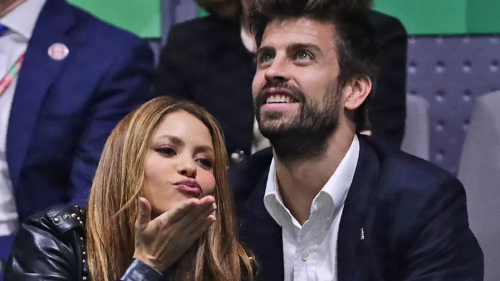 FILE - Colombian singer Shakira blows a kiss next to her husband Barcelona soccer player Gerard Pique while watching the Davis Cup final in Madrid, Spain, on Nov. 24, 2019. Colombian pop star Shakira and her partner, Spanish soccer star Gerard Piqu&eacute;, are separating. In a statement released on Saturday by Shakira's PR firm, the pair said: "We regret to confirm that we are separating. For the well-being of our children, who are our highest priority, we ask that you respect our privacy. (AP Photo/Manu Fernandez, File)