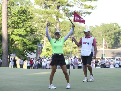 Jun 5, 2022; Southern Pines, North Carolina, USA; Minjee Lee celebrates after winning the U.S. Women's Open. Mandatory Credit: David Yeazell-USA TODAY Sports