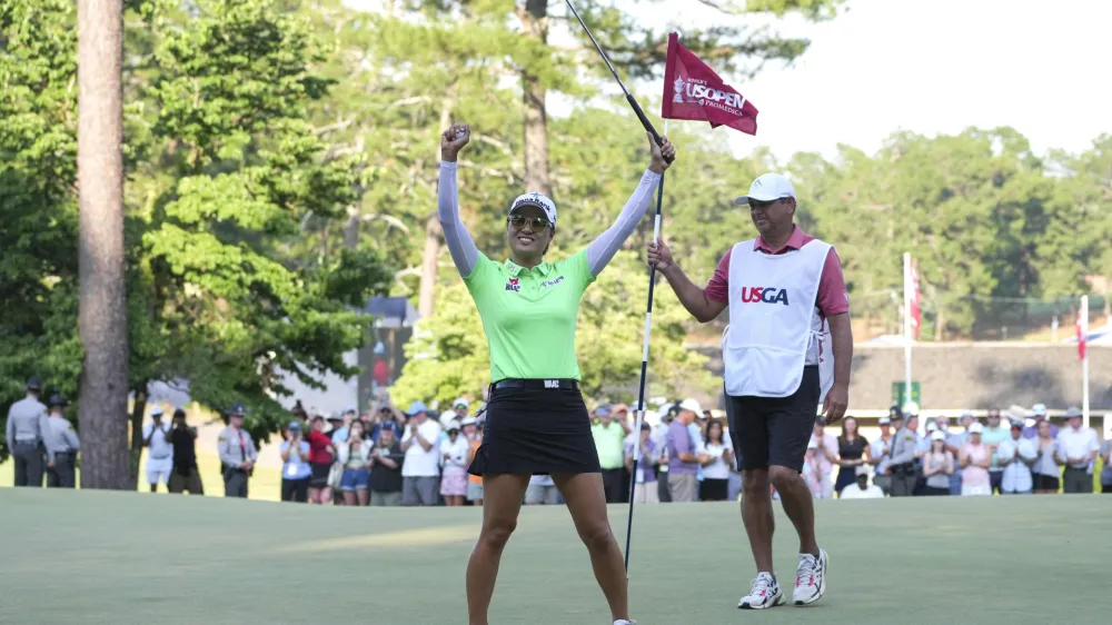 Jun 5, 2022; Southern Pines, North Carolina, USA; Minjee Lee celebrates after winning the U.S. Women's Open. Mandatory Credit: David Yeazell-USA TODAY Sports