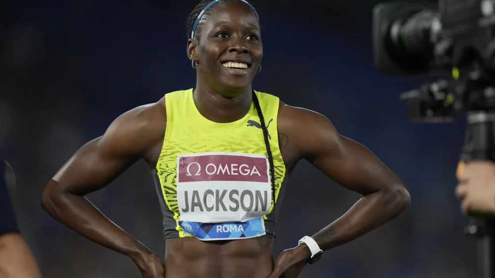 Shericka Jackson smiles after winning the women's 200-meter competitionat the Golden Gala Pietro Mennea IAAF Diamond League athletics meeting in Rome, Thursday, June 9, 2022. (AP Photo/Andrew Medichini)