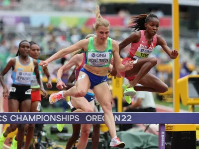 Athletics - World Athletics Championships - Women's 3000 Metres Steeplechase - Heats - Hayward Field, Eugene, Oregon, U.S. - July 16, 2022 Bahrain's Winfred Mutile Yavi and Slovenia's Marusa Mismas Zrimsek in action during the women's 3000 metres steeplechase REUTERS/Lucy Nicholson