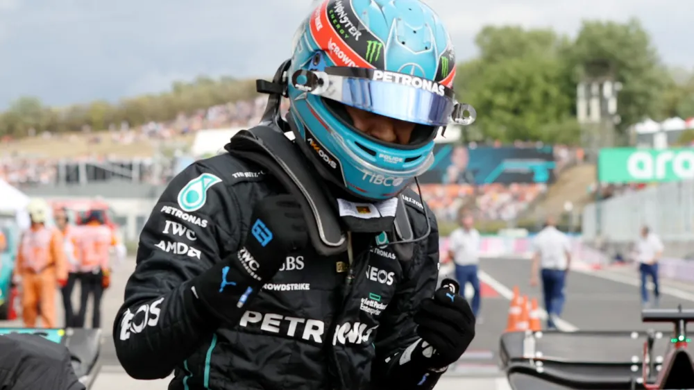 Formula One F1 - Hungarian Grand Prix - Hungaroring, Budapest, Hungary - July 30, 2022 Mercedes' George Russell celebrates after qualifying in pole position REUTERS/Bernadett Szabo
