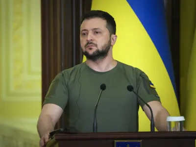 Ukraine's President Volodymyr Zelenskyy speaks during a joint news conference with International Atomic Energy Agency (IAEA) Director General Rafael Grossi in Kyiv, Ukraine, Tuesday, April 26, 2022. (AP Photo/Efrem Lukatsky)