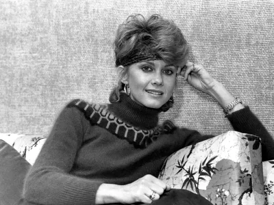 FILE - Australian pop-singer Olivia Newton-John poses in Los Angeles, Calif., on Nov. 21. 1982. Newton-John, a longtime resident of Australia whose sales topped 100 million albums, died Monday at her southern California ranch, John Easterling, her husband, wrote on Instagram and Facebook. She was 73. (AP Photo/Reed Saxon, File)