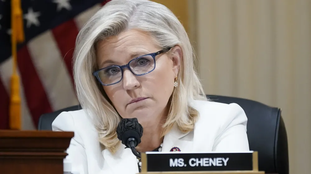 FILE - Vice Chair Liz Cheney, R-Wyo., listens as the House select committee investigating the Jan. 6 attack on the U.S. Capitol holds a hearing at the Capitol in Washington, June 23, 2022. Alaska U.S. Sen. Lisa Murkowski and Cheney hail from their states' most prominent Republican families and have been among the GOP's sharpest critics of former President Donald Trump. (AP Photo/J. Scott Applewhite, File)