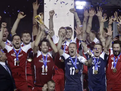 New world champions team Poland celebrates after winning the Men's World Championships volleyball final match between Brazil and Poland, in Turin, Italy, Sunday, Sept. 30, 2018. (AP Photo/Luca Bruno)