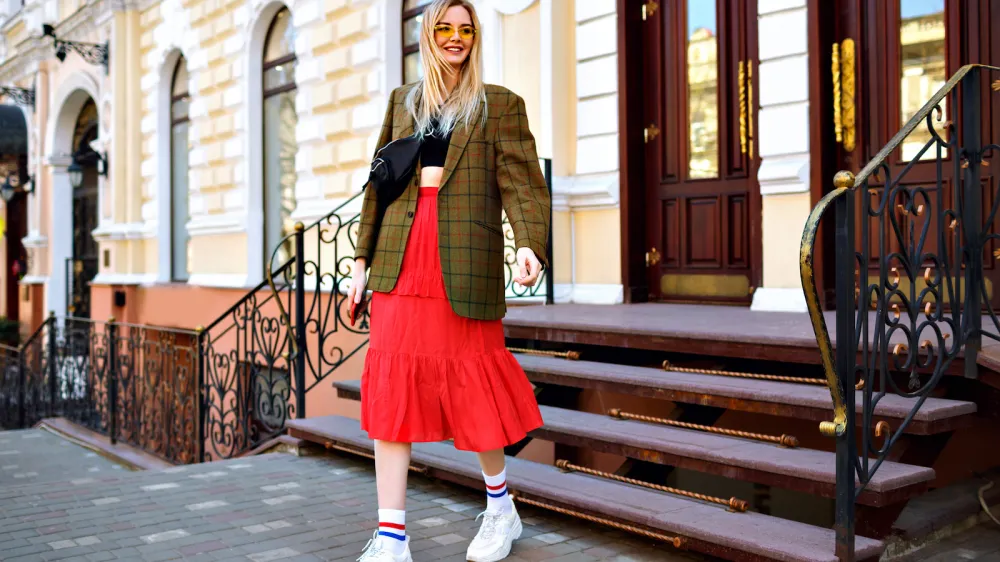 Vedno več je mladih, ki svoje modne kose najdejo v trgovinah z rabljenimi oblačili. F Shutterstock