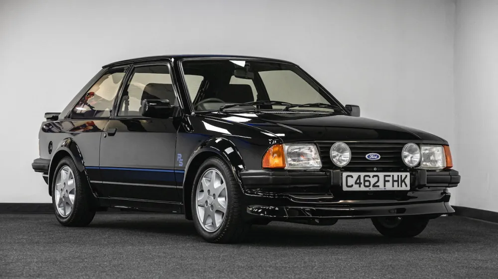 A 1985 Ford Escort RS Turbo S1 car formerly driven by the late Princess Diana, offered for sale via Silverstone Auctions on August 27, 2022, is seen in this undated handout photo taken in an unknown location. Silverstone Auctions /Handout via REUTERS THIS IMAGE HAS BEEN SUPPLIED BY A THIRD PARTY. MANDATORY CREDIT. NO RESALES. NO ARCHIVES. NO NEW USE AFTER SEPTEMBER 25, 2022