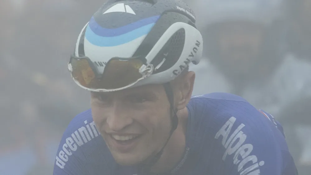 Australian rider Jay Vine from Alpecin Deceuninck team wins the 6th stage of the Vuelta cycling race between Bilbao and Pico Jano - San Miguel de Aguayo, northern Spain, Thursday, Aug. 25, 2022. (AP Photo/Miguel Oses)