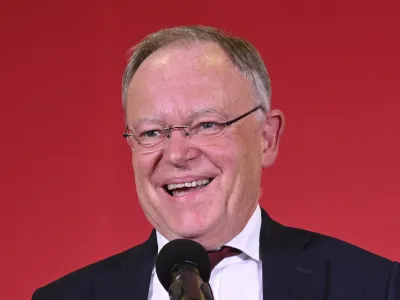Stephan Weil (SPD), Minister President of Lower Saxony, reacts to the first forecasts for the state elections in Lower Saxony in the SPD's caucus rooms in the Lower Saxony state parliament, in Hannover, Germany, Sunday, Oct.9, 2022. (Bernd von Jutrczenka/dpa via AP)