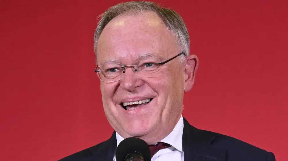 Stephan Weil (SPD), Minister President of Lower Saxony, reacts to the first forecasts for the state elections in Lower Saxony in the SPD's caucus rooms in the Lower Saxony state parliament, in Hannover, Germany, Sunday, Oct.9, 2022. (Bernd von Jutrczenka/dpa via AP)