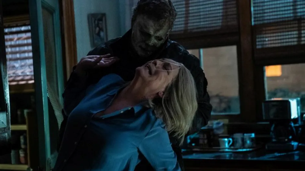 Michael Myers (aka The Shape) and Jamie Lee Curtis as Laurie Strode in HALLOWEEN ENDS, directed by David Gordon Green