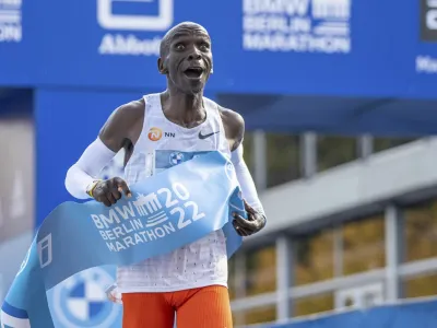 25 September 2022, Berlin: Athletics: Marathon, Decision(s) Marathon. Eliud Kipchoge crosses the finish line first at the BMW Berlin Marathon after 2:01:09 hours and thus a world record. Photo by: Andreas Gora/picture-alliance/dpa/AP Images
