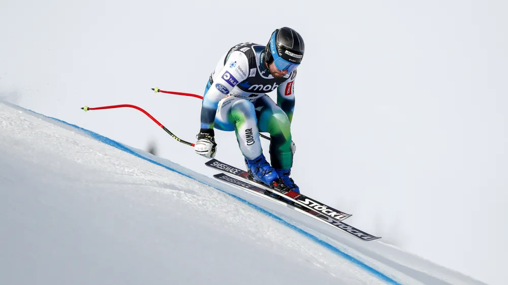 ﻿Slovenia's Martin Cater speeds down the course during an alpine ski, men's World Cup downhill training, in Kvitfjell, Norway, Thursday, March 3, 2022. (AP Photo/Gabriele Facciotti)