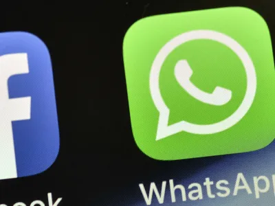 FILE - The WhatsApp icon is seen on an iPhone in Gelsenkirchen, Germany, on Nov. 15, 2018. People around the world are reporting problems sending and receiving messages on the popular chat app WhatsApp. According to Downdetector, which tracks outage reports, people started reporting problems around 3 a.m. EDT. on Tuesday, Oct. 24, 2022. (AP Photo/Martin Meissner, File)