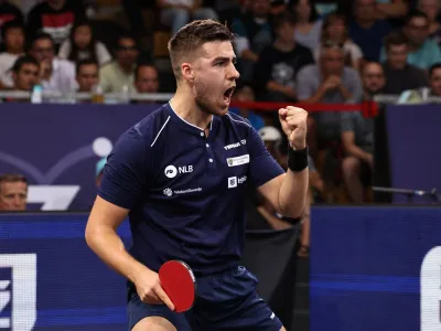 2022 European Championships - Table Tennis - Rudi-Sedlmayer-Halle, Munich, Germany - August 21, 2022 Slovenia's Darko Jorgic reacts during the Men's Singles Gold Medal match against Germany's Dang Qiu REUTERS/Lukas Barth