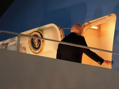 U.S. President Joe Biden boards Air Force One as he departs for Egypt to attend the COP27 summit from Joint Base Andrews in Maryland, U.S., November 10, 2022. REUTERS/Kevin Lamarque