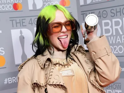 18 February 2020, England, London: American singer Billie Eilish holds the Brit Award for Best International Female during the Brit Awards 2020 at the O2 Arena. Photo: Ian West/PA Wire/dpa