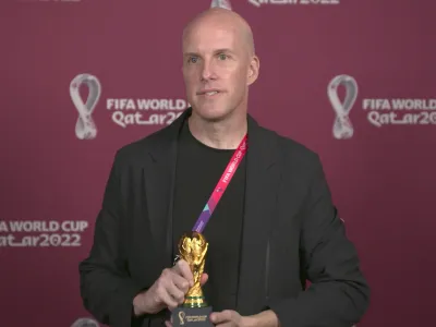 A screenshot taken from video provided by FIFA of journalist Grant Wahl at an awards ceremony in Doha, Qatar in Nov. 2022. Wahl, one of the most well-known soccer writers in the United States, died early Saturday Dec. 10, 2022 while covering the World Cup match between Argentina and the Netherlands. (FIFA via AP)