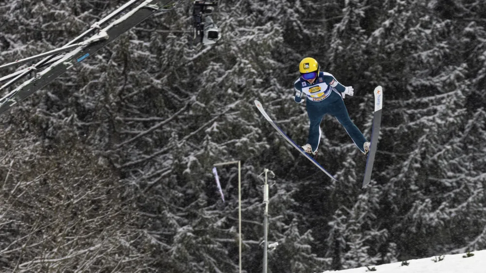Japan's Sara Takanashi jumps from the Hochfirstschanze during the 1st round of large hill mixed at the Nordic skiing/ski jumping World Cup, in Titisee-Neustadt, Germany, Saturday Dec. 10, 2022. (Philipp von Ditfurth/dpa via AP)