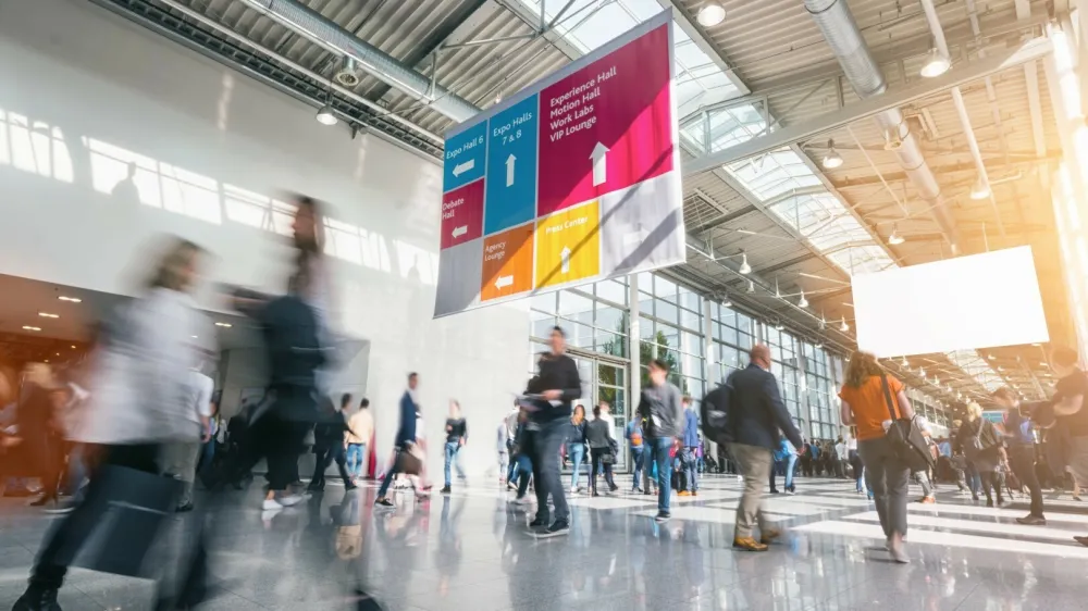 crowd of business people rushing on a trade show. ideal for websites and magazines layouts