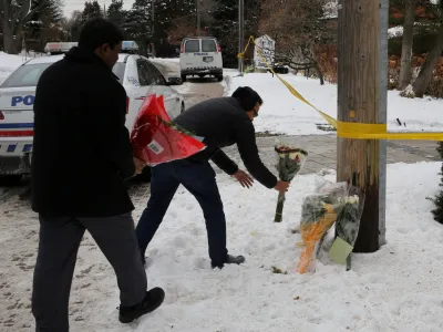 ﻿FILE PHOTO: Mourners place flowers outside the home of billionaire founder of Canadian pharmaceutical firm Apotex Inc., Barry Sherman and his wife Honey, who were found dead under circumstances that police described as "suspicious", in Toronto, Ontario, Canada, December 17, 2017. REUTERS/Chris Helgren/File Photo