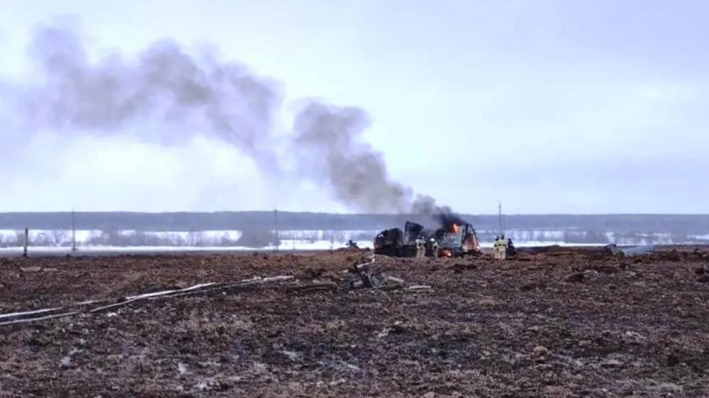 In this image made from video provided by the Russian Emergency Situations Ministry press service on Tuesday, Dec. 20, 2022, firefighters work at the site of gas explosion, near the village of Yambakhtino, some 50km (31miles) south of Cheboksary, Chuvashia region, Russia. An explosion on a section of Europe-bound natural gas pipeline in western Russia has killed three people but hasn't affected export supplies, officials said. The explosion ripped through a section of the Urengoy-Pomary-Uzhhorod pipeline in the Chuvashia region during repair works on Tuesday. (Ministry of Emergency Situations press service via AP)