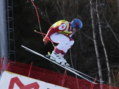 Austria's Matthias Mayer speeds down the course during an alpine ski, men's World Cup downhill training, in Bormio, Italy, Tuesday, Dec.27, 2022. (AP Photo/Marco Trovati)