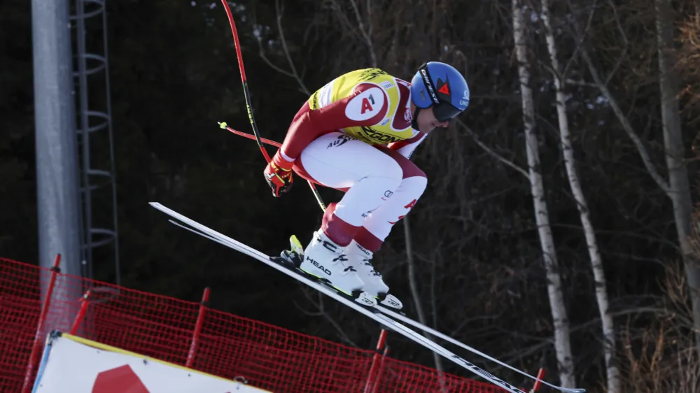 Austria's Matthias Mayer speeds down the course during an alpine ski, men's World Cup downhill training, in Bormio, Italy, Tuesday, Dec.27, 2022. (AP Photo/Marco Trovati)