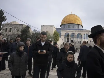 Jewish worshippers visit the Temple Mount at Al-Aqsa Mosque compound, known to Muslims as the Noble Sanctuary, in the Old City of Jerusalem, Tuesday, Jan. 3, 2023. Itamar Ben-Gvir, an ultranationalist Israeli Cabinet minister, visited the flashpoint Jerusalem holy site Tuesday for the first time since taking office in Prime Minister Benjamin Netanyahu's new far-right government last week. The visit is seen by Palestinians as a provocation. (AP Photo/Maya Alleruzzo)